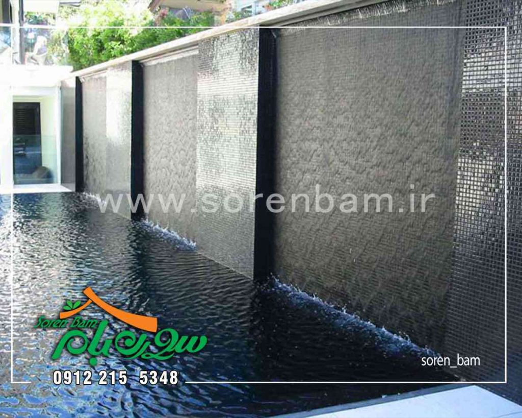 اجرای آبنمای دیواری سنگی در دیواره های استخر